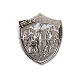 Pioneer Trek silver shield lapel pin
